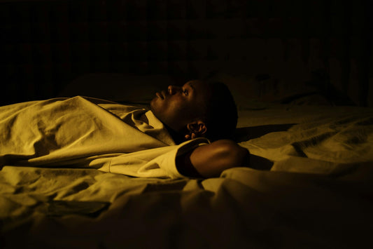 A man lying awake at nighttime