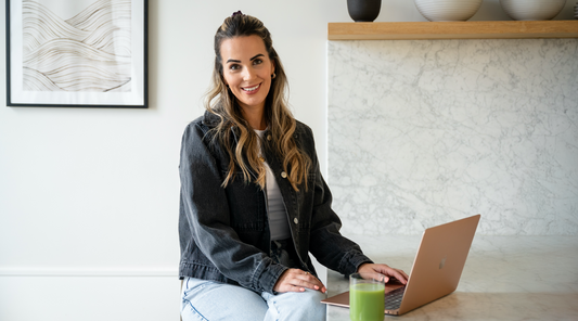 Image of co-founder sitting at laptop