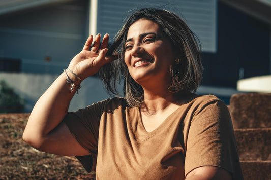 A woman looking happy in the sun 