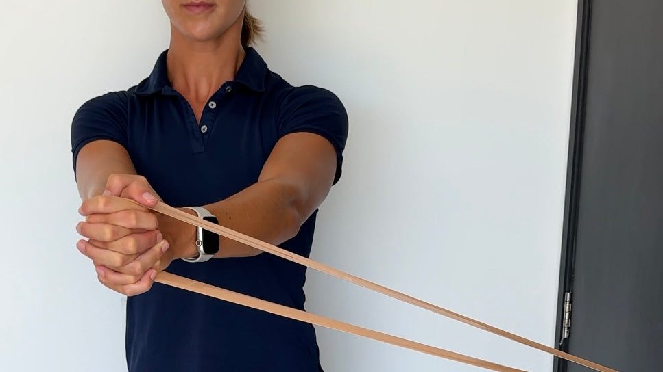 A woman using a resistance band 