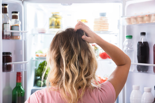 Woman looking in the fridge