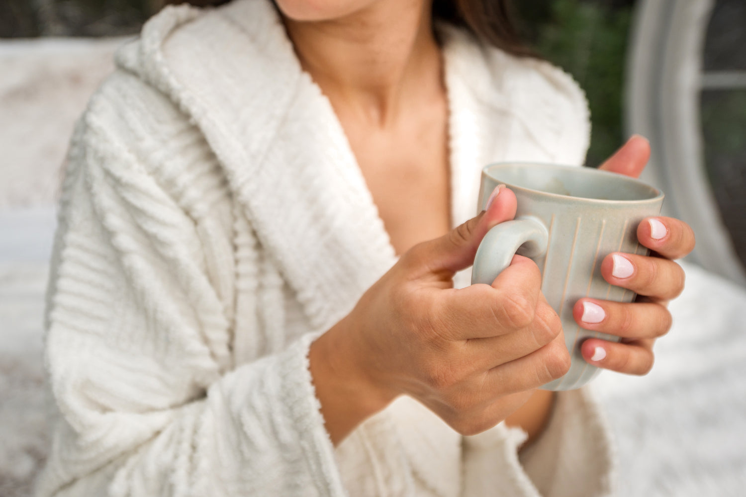 Holding Coffee